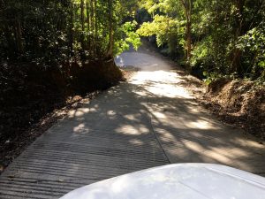 To reduce the environmental impact of the track there were fewer bends created and therefore the gradient had to increase. This one was the worst at 20%. Sealing this section with corrugations makes it easier to negotiate.